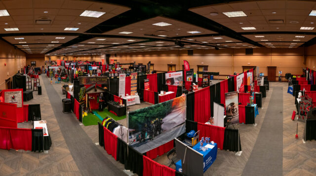 Trade-show booths inside the Penticton Trade and Convention Centre ballroom — A trade-show layout in the Penticton Trade and Convention Centre’s ballroom, from the venue’s image gallery. This is a venue file photograph, not the upcoming 2027 job fair. Photo: Penticton Trade and Convention Centre.