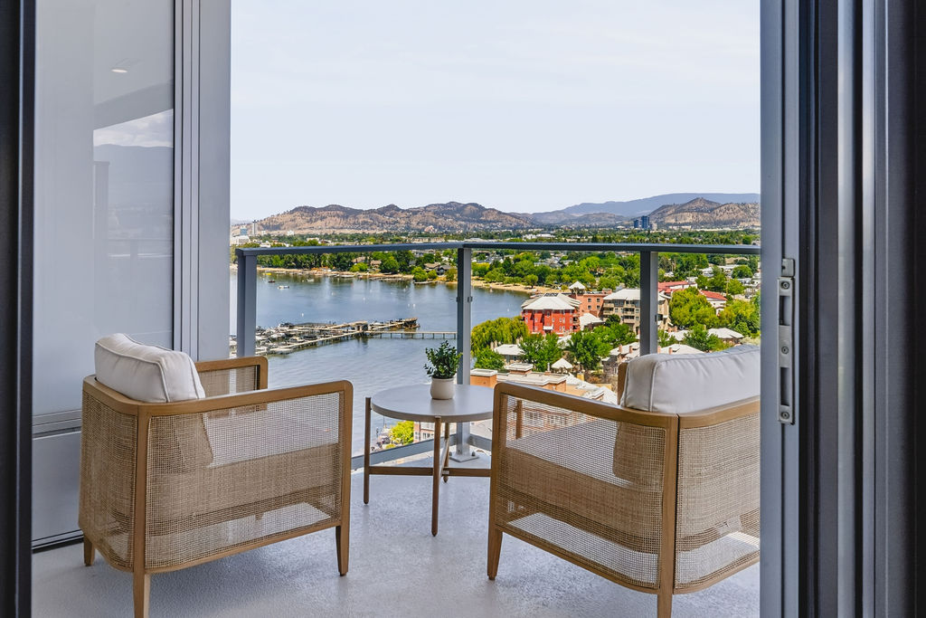 A furnished balcony overlooking water, supplied by Lifty Life.