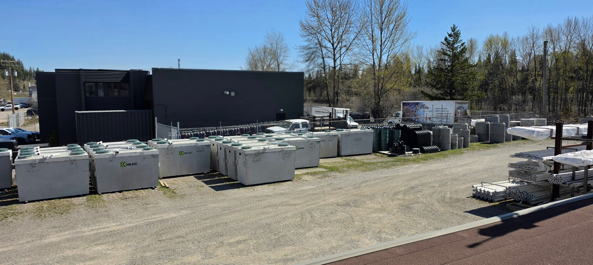 Concrete septic tanks and other supplies in the Pay-N-Save yard. — Pay-N-Save Building Supplies yard in Prince George. Photo: Pay-N-Save Building Supplies.